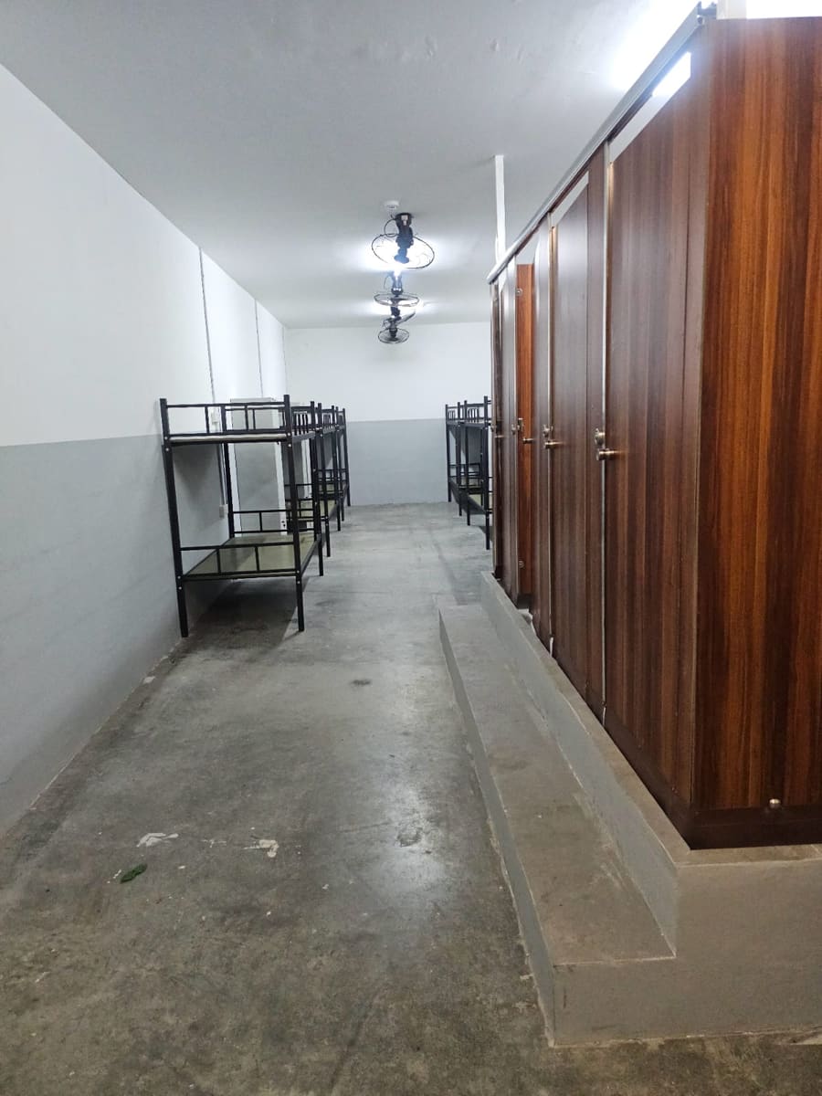 Dormitory room with toilet cubicles — NextDorm31@Tuas dormitory in Tuas, Singapore
